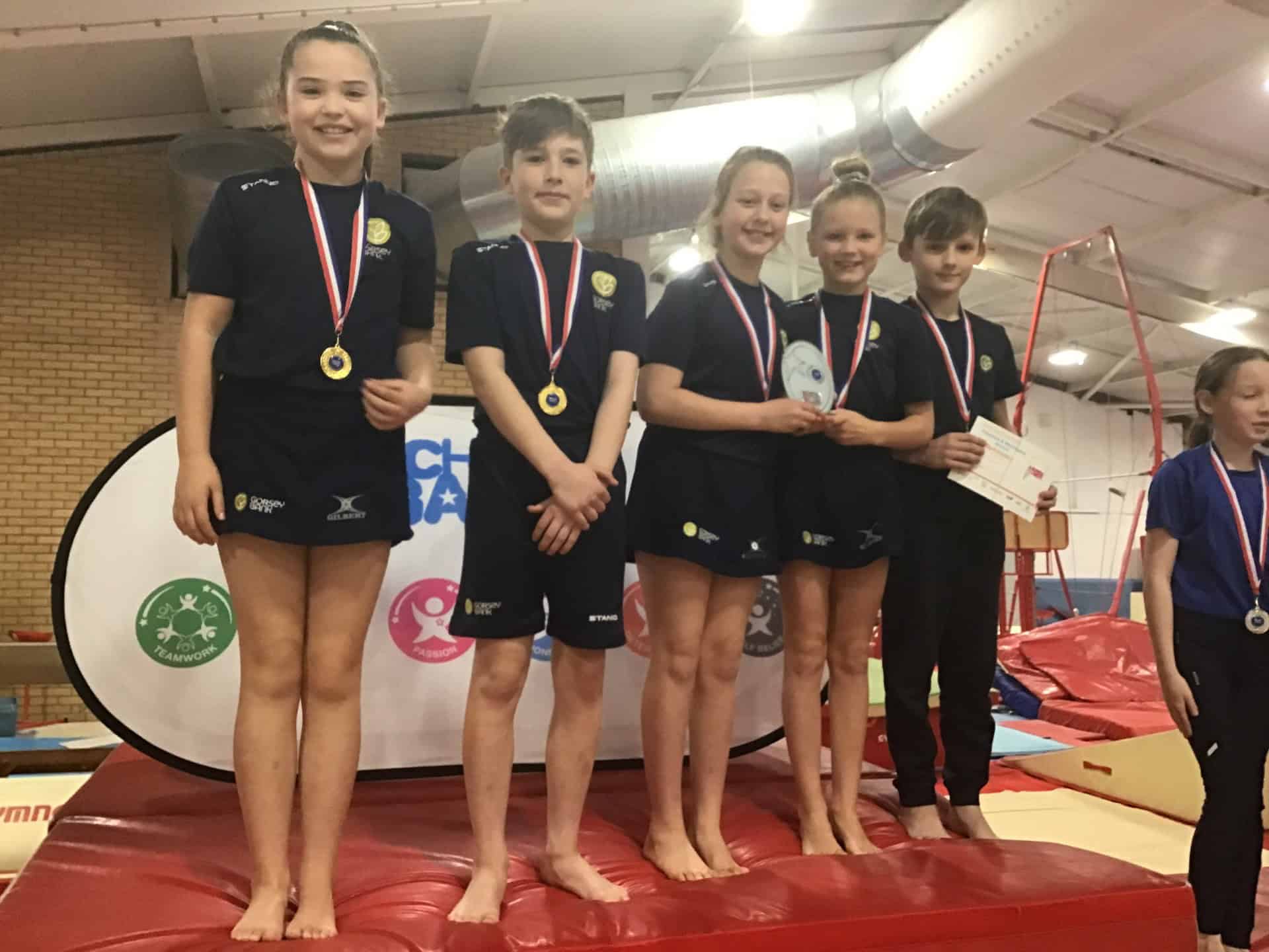 Gorsey pupils accepting awards at Gymnastics.
